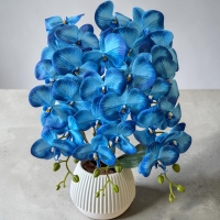 Artificial orchid on 3 branches in a round pot with latex flowers