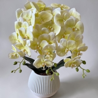 Artificial orchid on 3 branches in a round pot with latex flowers